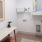 a room with a table and shelves